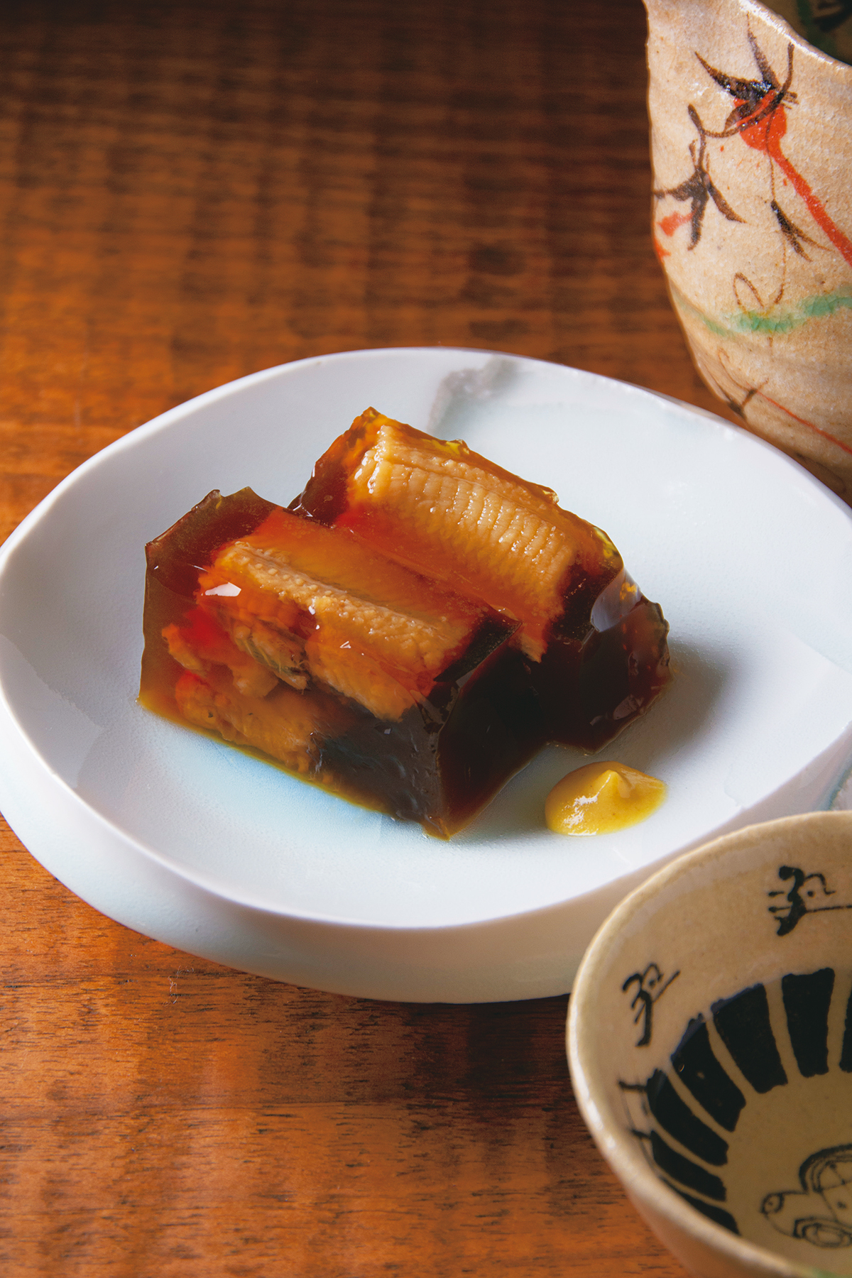 『浅草　ひら山』穴子煮こごり　600円　舌の温度で瞬時に溶けるほど繊細。穴子の爽やかな風味が日本酒を呼ぶ